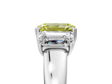 Platinum Three-Stone Fancy Yellow Emerald Cut Cut Diamond Ring with Channel Set Band and Four-Prong Setting_29