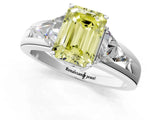 Platinum Three-Stone Fancy Yellow Emerald Cut Cut Diamond Ring with Trillion Side Stones on a Split Shank Band_13