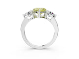 Platinum Three-Stone Fancy Yellow Heart  Brilliant Cut Solitaire Ring with Prong Setting on a Classic Band 3
