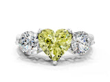 Platinum Three-Stone Fancy Yellow Heart  Brilliant Cut Solitaire Ring with Prong Setting on a Classic Band