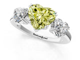 Platinum Three-Stone Fancy Yellow Heart Cut Cut Diamond Ring with Channel Set Band and Four-Prong Setting_25