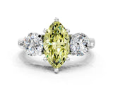 Platinum Three-Stone Fancy Yellow Marquise  Brilliant Cut Solitaire Ring with Prong Setting on a Classic Band