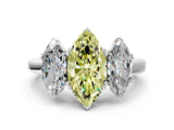 Platinum Three-Stone Fancy Yellow Marquise Cut Cut Diamond Ring with Channel Set Band and Four-Prong Setting_30