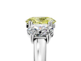 Platinum Three-Stone Fancy Yellow Oval Cut Cut Diamond Ring with Channel Set Band and Four-Prong Setting_24