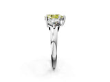 Platinum Three-Stone Fancy Yellow Pear  Brilliant Cut Solitaire Ring with Prong Setting on a Classic Band 3