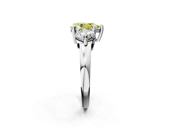 Platinum Three-Stone Fancy Yellow Pear  Brilliant Cut Solitaire Ring with Prong Setting on a Classic Band