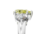 Platinum Three-Stone Fancy Yellow Pear  Brilliant Cut Solitaire Ring with Prong Setting on a Classic Band