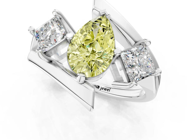 Platinum Three-Stone Fancy Yellow Pear Cut Cut Tension Band Ring with Four-Prong Setting