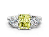 Platinum Three-Stone Fancy Yellow Radiant  Brilliant Cut Solitaire Ring with Prong Setting on a Classic Band 1