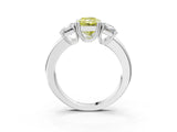 Platinum Three-Stone Fancy Yellow Radiant Cut Cut Diamond Ring with Channel Set Band and Four-Prong Setting_40