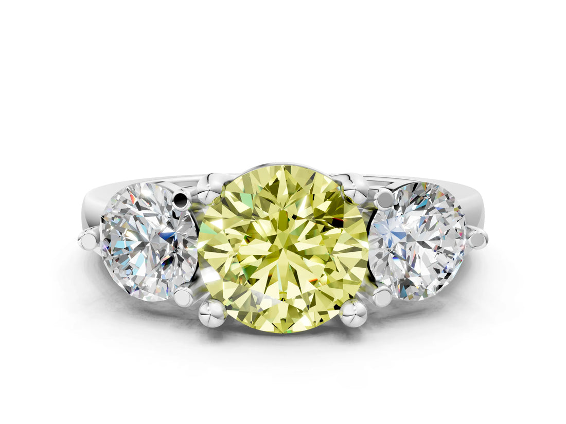 Platinum Three-Stone Fancy Yellow Round  Brilliant Cut Solitaire Ring with Prong Setting on a Classic Band
