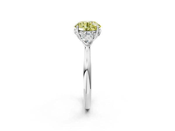 Platinum Three-Stone Fancy Yellow Round Cut Diamond Ring with Pear  Side Stones in Four-Prong Setting