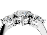 Platinum Three-Stone Heart Brilliant Cut Solitaire Ring with Prong Setting on a Classic Band