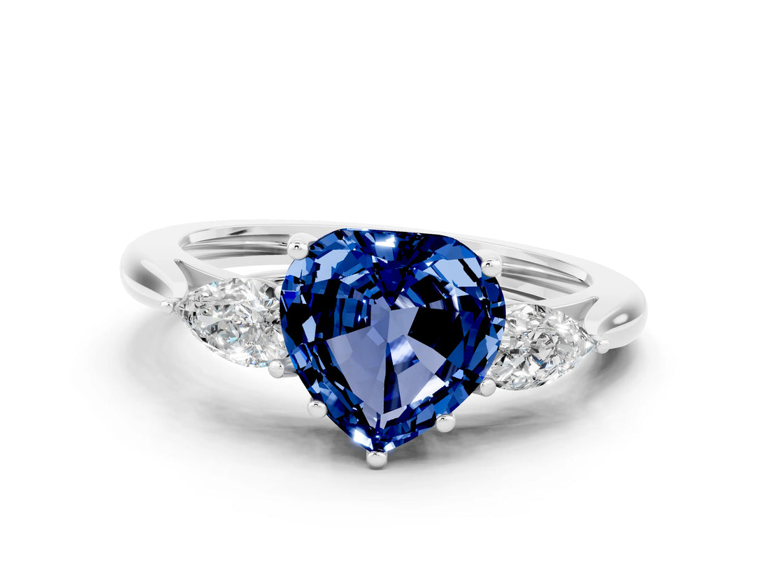 Platinum Three-Stone Heart Cut Blue Sapphire Ring with Pear  Side Stones in Four-Prong Setting_54