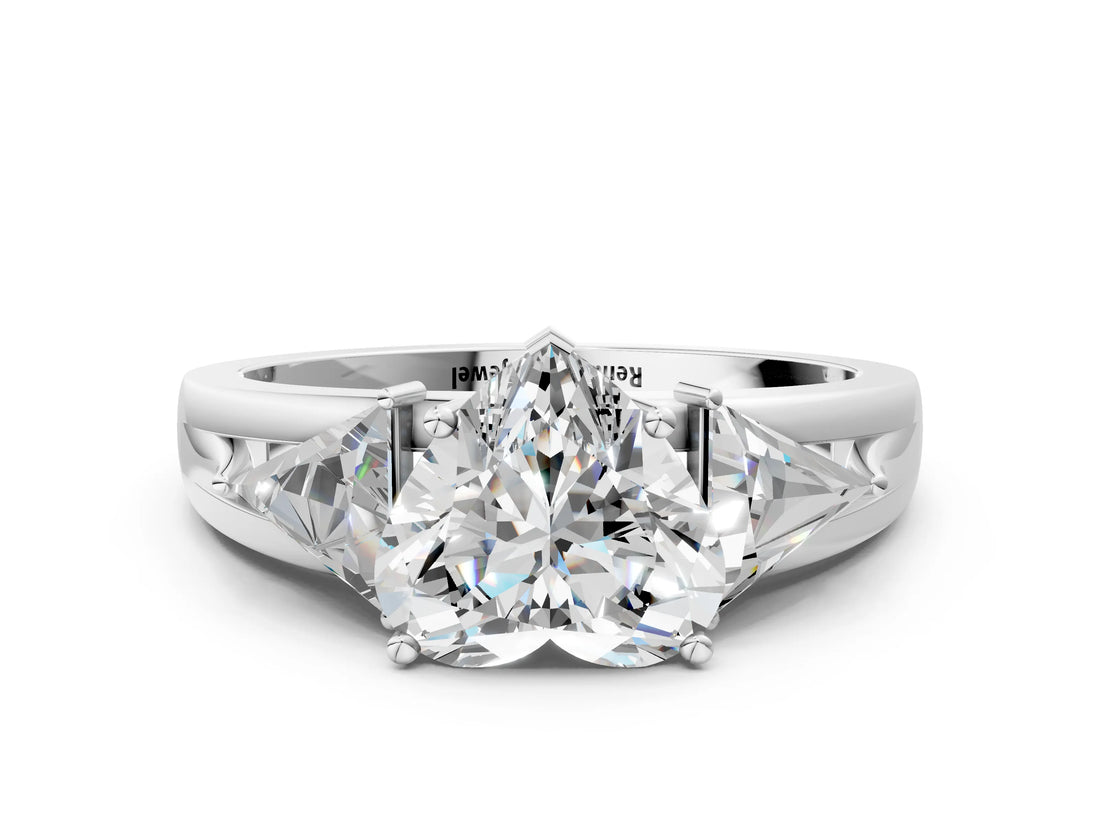 Platinum Three-Stone Heart Cut Cut Diamond Ring with Trillion Side Stones on a Split Shank Band_25