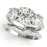 Platinum Three-Stone Heart Cut Diamond Engagement Ring with Prong Setting on a White Gold Band 1