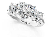 Platinum Three-Stone Heart Cut Diamond Engagement Ring with Prong Setting on a White Gold Band_31