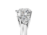 Platinum Three-Stone Heart Cut Diamond Ring with Channel Set Band and Four-Prong Setting_23