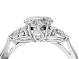 Platinum Three-Stone Heart Cut Diamond Ring with Pear  Side Stones in Four-Prong Setting_20