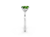Platinum Three-Stone Heart Cut Peridot Ring with Pear  Side Stones in Four-Prong Setting_56
