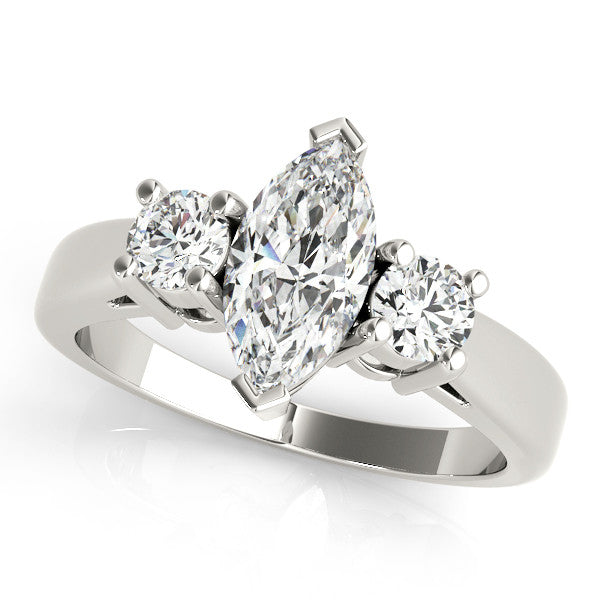 White gold Three-Stone Emerald Cut Diamond Solitaire with Round Accents and Prong Setting on a Classic Band