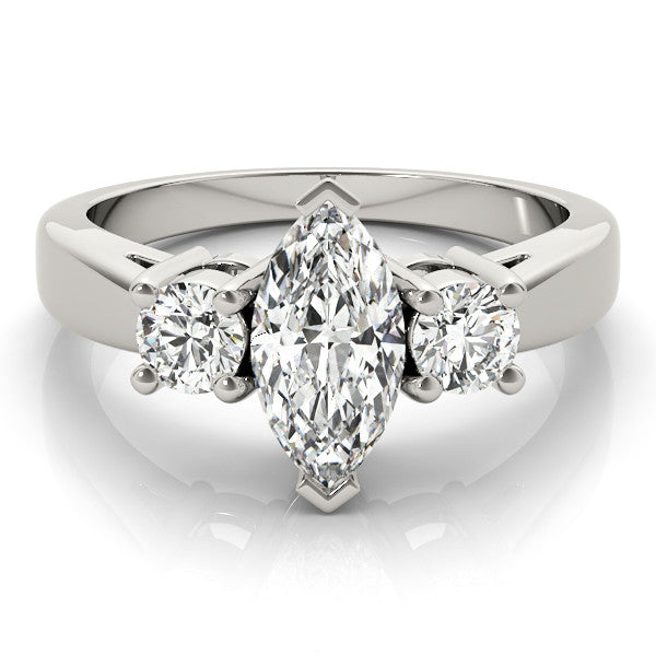 White gold Three-Stone Emerald Cut Diamond Solitaire with Round Accents and Prong Setting on a Classic Band