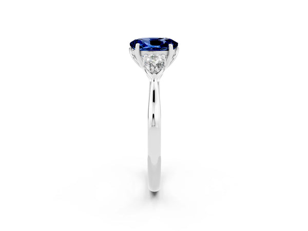 Platinum Oval Lab-Grown Blue Sapphire Three Stone Engagement Ring with Pear Side Stones and Thin Band