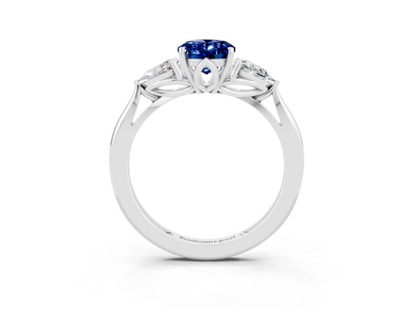 Platinum Oval Lab-Grown Blue Sapphire Three Stone Engagement Ring with Pear Side Stones and Thin Band