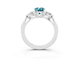 Platinum Three-Stone Oval Cut Blue Topaz Ring with Pear  Side Stones in Four-Prong Setting_57