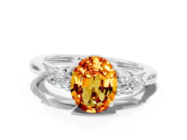 Platinum Three-Stone Oval Cut Citrine Ring with Pear  Side Stones in Four-Prong Setting