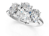 Platinum Three-Stone Oval Cut Diamond Engagement Ring with Prong Setting on a White Gold Band_43