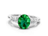 Platinum Three-Stone Oval Cut Emerald Ring with Pear  Side Stones in Four-Prong Setting_54