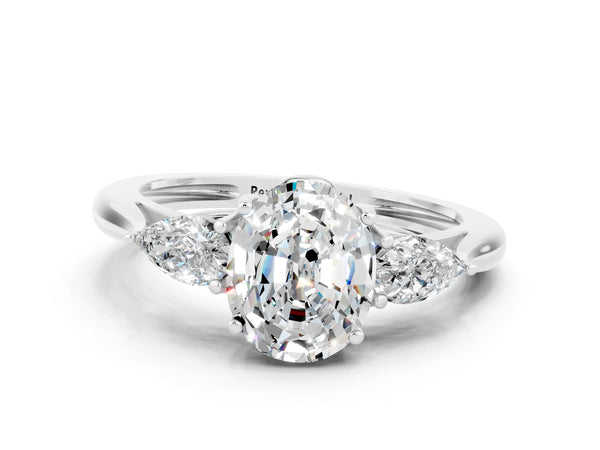 Platinum Three-Stone Oval Cut Moissanite Ring with Pear  Side Stones in Four-Prong Setting