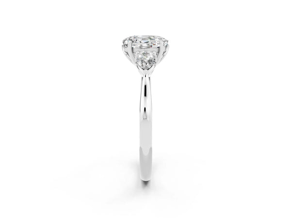 Platinum Three-Stone Oval Cut Moissanite Ring with Pear  Side Stones in Four-Prong Setting