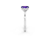 Platinum Three-Stone Oval Cut Tanzanite Ring with Pear  Side Stones in Four-Prong Setting_56