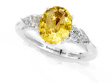 Platinum Three-Stone Oval Cut Yellow Sapphire Ring with Pear  Side Stones in Four-Prong Setting_55