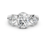 Platinum Three-Stone Oval and Princess Cut Diamond Ring with Channel Band and Four-Prong Setting_16