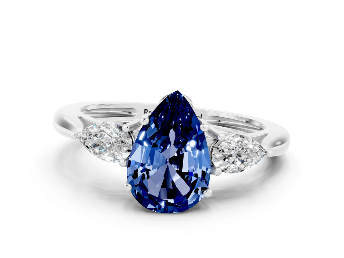 Platinum Three-Stone Pear Cut Blue Sapphire Ring with Pear  Side Stones in Four-Prong Setting_54