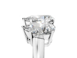 Platinum Three-Stone Pear Cut Diamond Ring with Channel Set Band and Four-Prong Setting_23