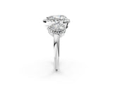 Platinum Three-Stone Pear Cut Halo Diamond Ring with Pave Band and Four-Prong Setting_33