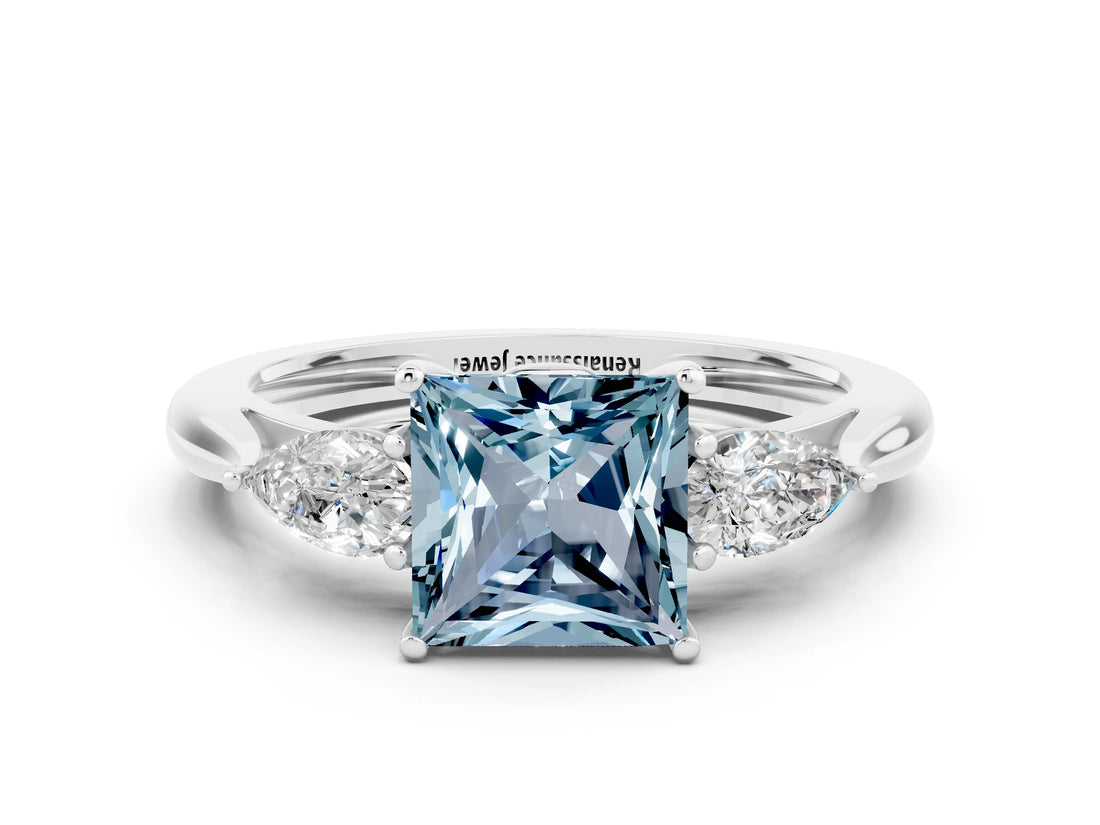 Platinum Three-Stone Princess Cut Aquamarine Ring with Pear  Side Stones in Four-Prong Setting_54