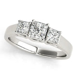Platinum Three-Stone Princess Cut Diamond Engagement Ring with Channel Set Band and Four-Prong Setting