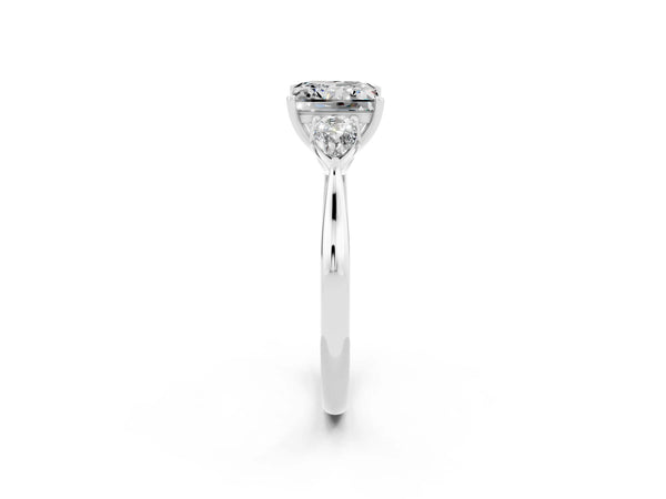 Platinum Three-Stone Princess Cut Moissanite Ring with Pear  Side Stones in Four-Prong Setting