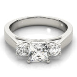 Platinum Three-Stone Princess Cut Solitaire Ring with Round Side Stones and Four-Prong Setting 1