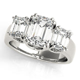14K White Gold Three-Stone 3.09 Carat D VVS1 Round Cut Diamond Ring with Channel Set Band and Four-Prong Setting