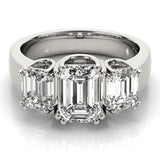 10K White Gold Three-Stone 1.54 Carat D VVS2 Emerald Cut Diamond Ring with Channel Set Band and Four-Prong Setting