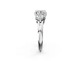 Platinum Three-Stone Round Brilliant Cut Solitaire Ring with Prong Setting on a Classic Band 2