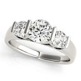 Platinum Three-Stone Round Brilliant Diamond Ring with Channel Setting and White Gold Band