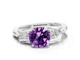 Platinum Three-Stone Round Cut Amethyst Ring with Pear  Side Stones in Four-Prong Setting_54