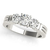 Platinum Three-Stone Round Cut Channel Set Diamond Ring with Four-Prong Setting